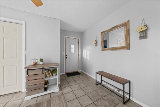 The side entrance welcomes you directly into a warm and inviting dining space, perfect for everyday meals.