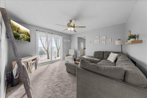 Enjoy both sunrise and sunset views from the spacious family room, where large windows fill the space with natural light and showcase the incredible countryside scenery year-round!