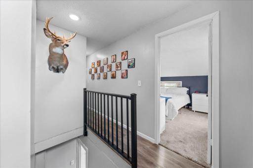 Welcome upstairs, where youâll find comfortable bedrooms, charming farmhouse character, and peaceful views that create the perfect space to unwind and relax!jpg