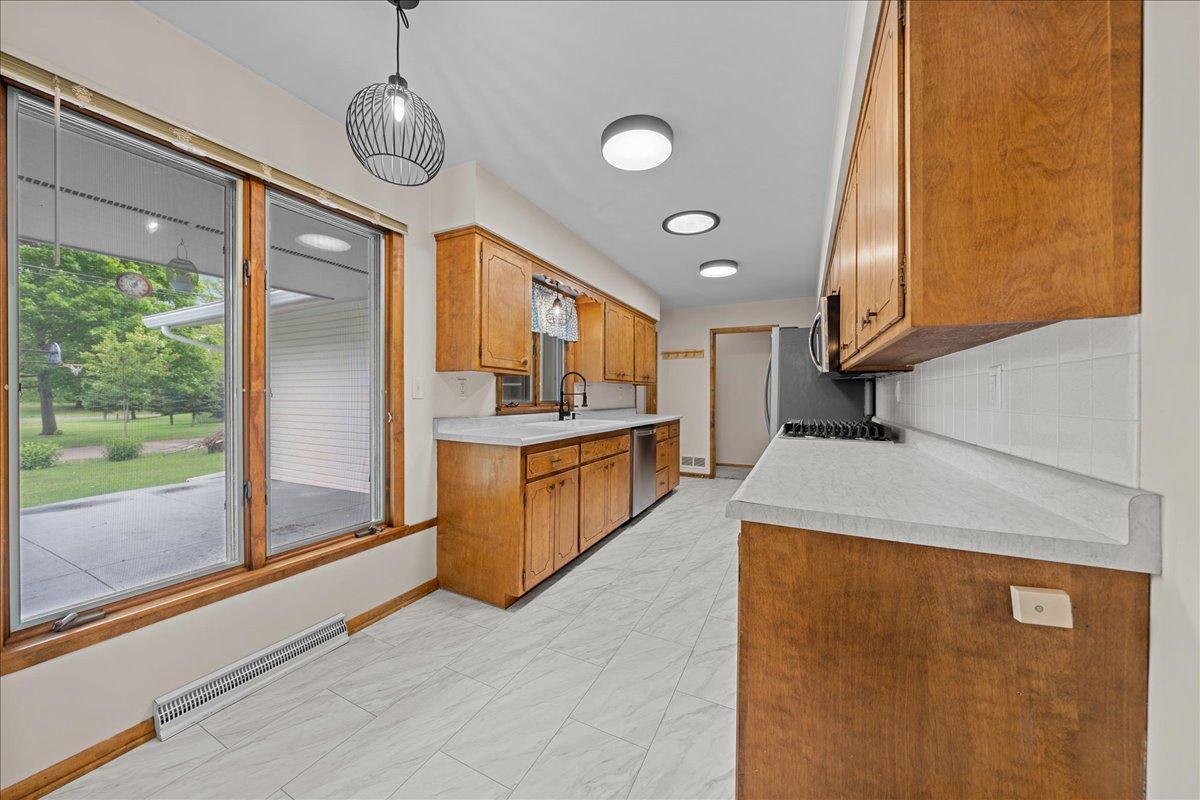 Thoughtful kitchen layout with ample counter space and tons of storage