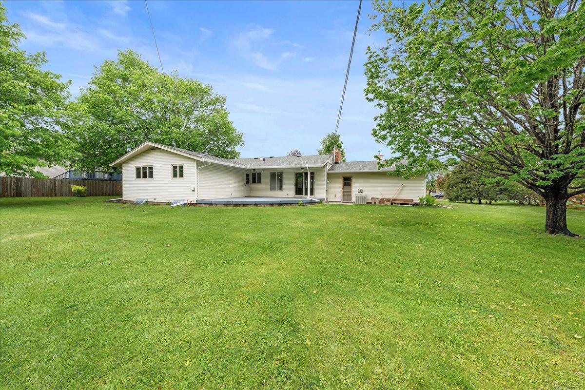The large backyard creates a peaceful outdoor retreat with plenty of space for entertaining on the private patio, gardening, or relaxing.