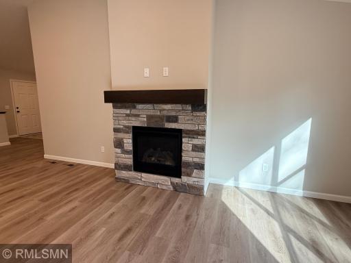Stone gas fireplace lends the right ambience
