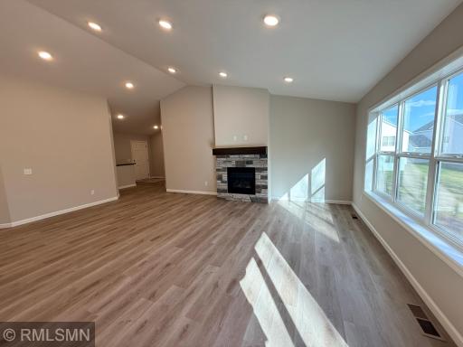 The luxury plank flooring throughout the main level allows for many furniture configurations, whether a large or small gathering