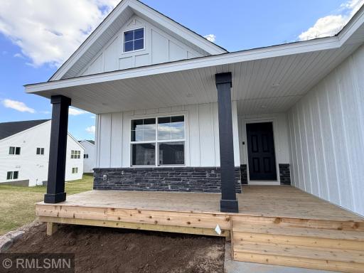 Oversize front porch with plenty of space to sit and enjoy!