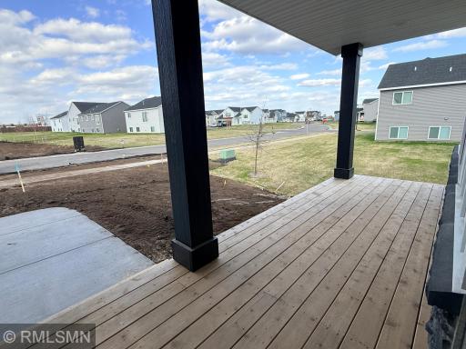 Oversize front porch with plenty of space to sit and enjoy!