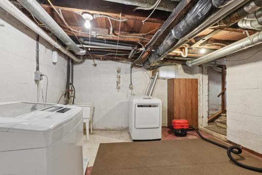 The Partial Basement is Perfect for Laundry and Projects.