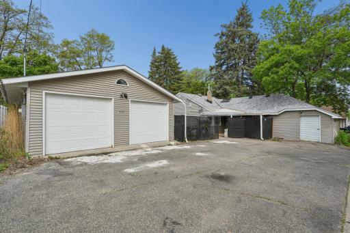 The Garage is 32' x 24' and has 8' tall garage doors. Also another Storage Shed Connected to the House. Enough Parking for 7 Cars Outside.