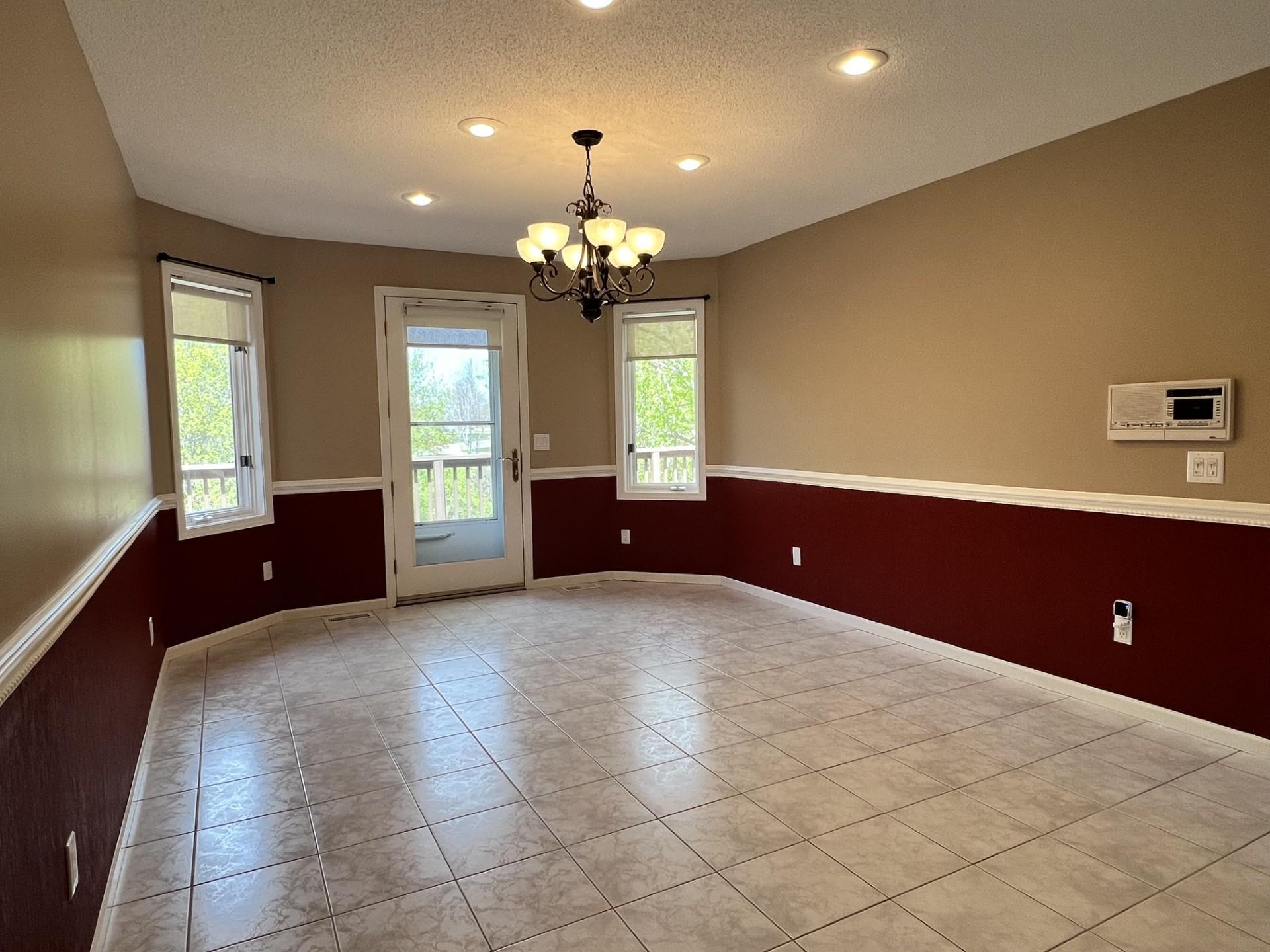 Dining room with door to back deck