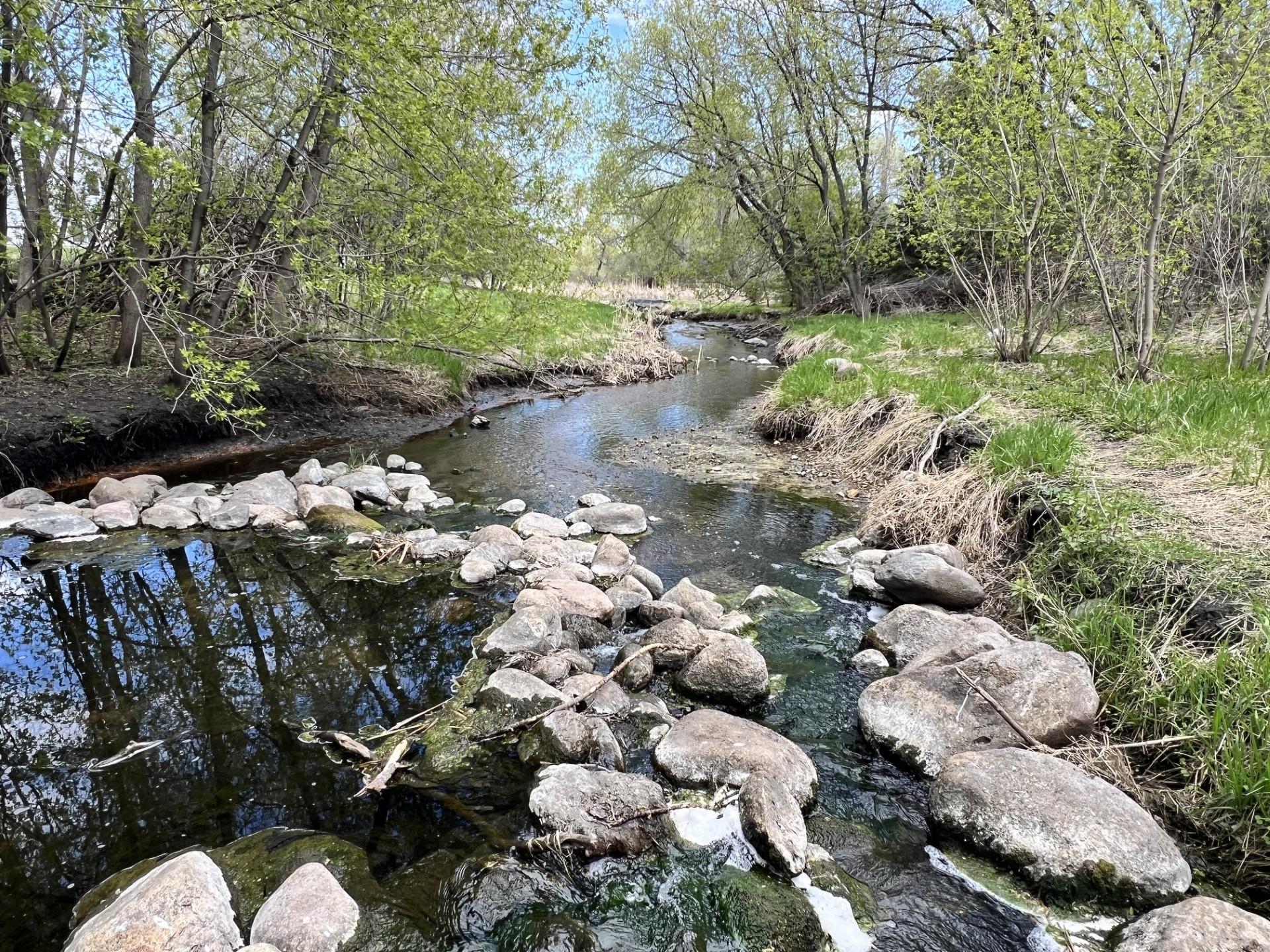 Property meets up with a cute litte stream