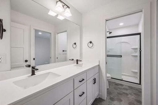 Upper level 3/4 bathroom with dual sinks