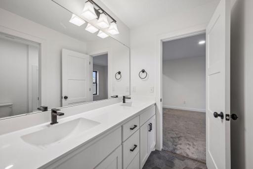 Full Jack & Jill bathroom that services bedrooms 2 and 3