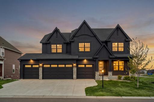Welcome home to 11115 Quantico Lane N in Sundance Greens