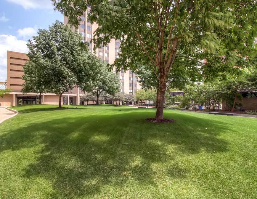 Parklike grounds. Pool has shower, changing room, and bathroom..png