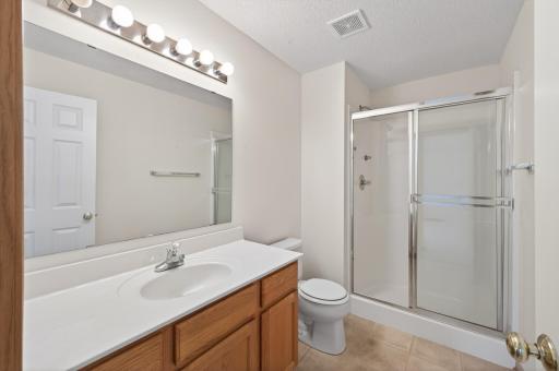 Private primary 3/4 bath with step in shower