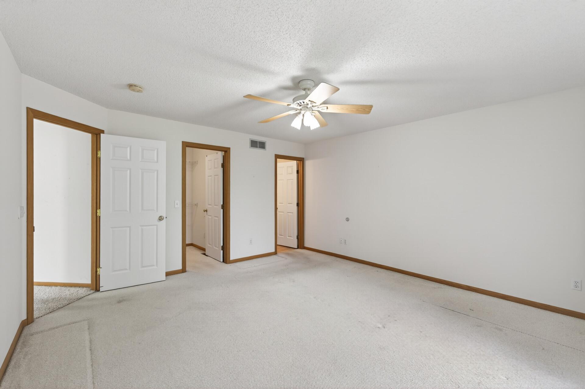 Primary - looking toward the private bathroom and WIC
