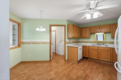 Breakfast nook, plus a glimpse at the laundry room