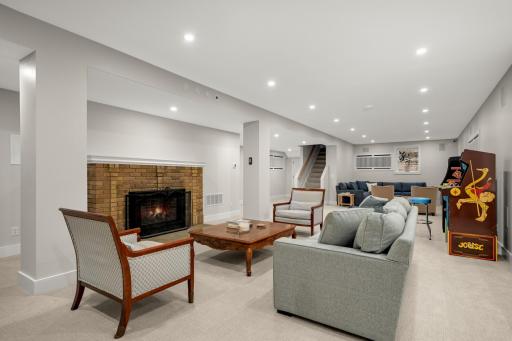 The lower level was also gutted to the studs and now offers a Rec room with a fireplace.