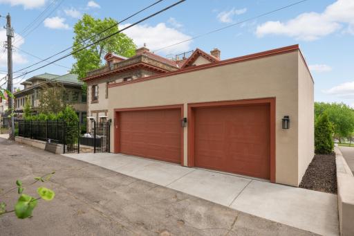 NEWLY constructed attached 3-car garage with EV charger & epoxied floors.