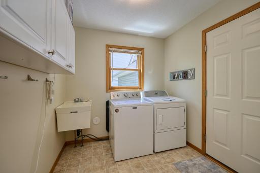 Main floor laundry/mud room with closet space