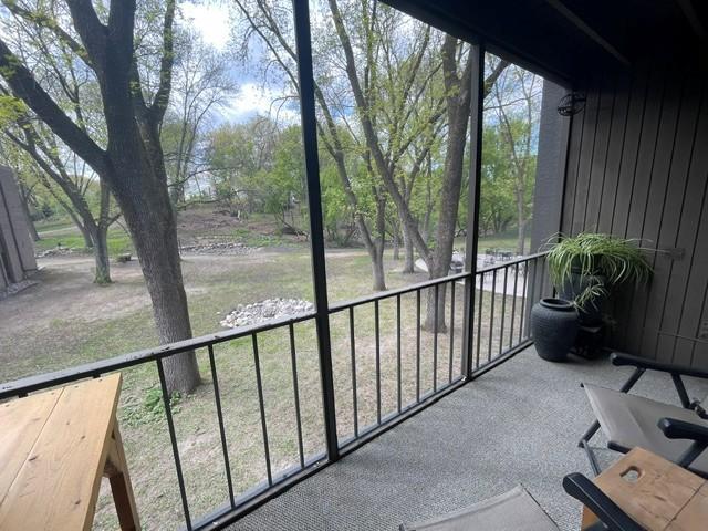 6075 Lincoln Drive #203, Edina, MN 55436 screened porch with beautiful views