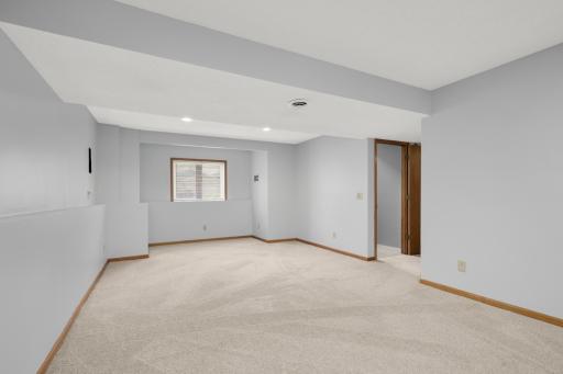 Freshly painted, new carpet and room to grow. Movie room, workout room, second family room? You choose