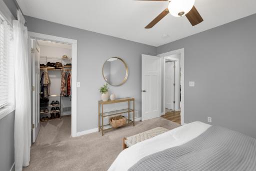 Primary bedroom features a very nice sized walk in closet and a fan to help keep you cool on those hot summer nights