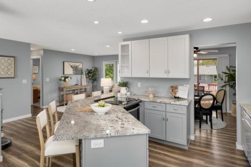 Seating for 4 at the breakfast bar, granite countertops, tons of cabinets all components you would find at a much higher price point. This kitchen is a 10!