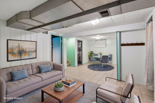 Virtually staged lower level family room.