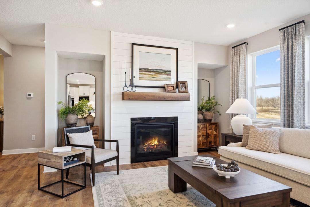 Home for sale will have the same full wall of shiplap and the rustic mantle shown here.
