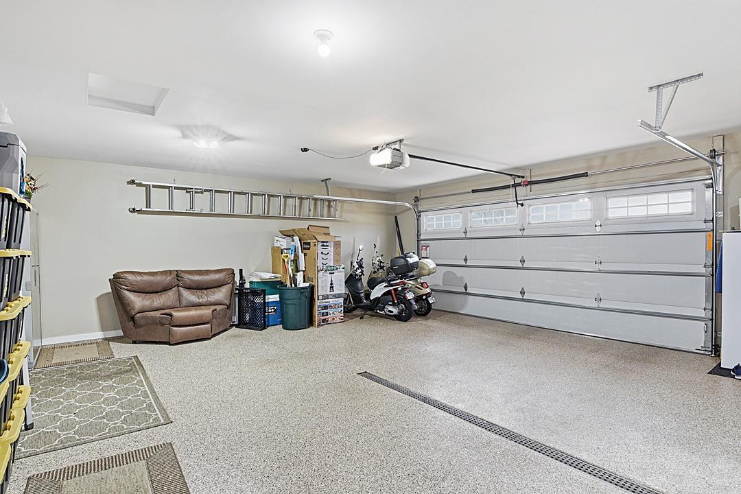 Finished 3 stall Garage, Insulated, Painted, Trimmed, Drain, Professional Coated Floors, Heated