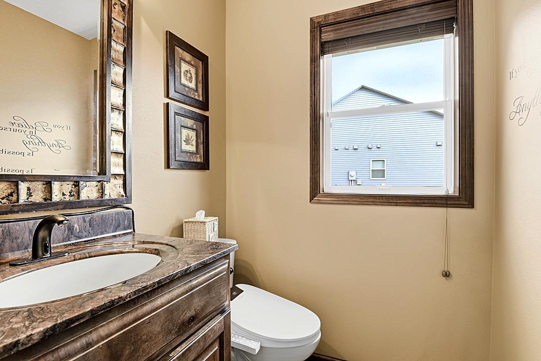 Half Bath by Garage Entry way, Touchless faucet, Bidet with warm water.