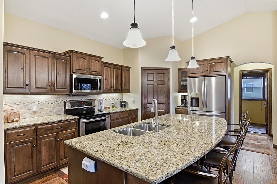 Kitchen; Maple Cabinets, Hickory Hardwood Floors, Granite Countertops, Stainless Appliances, Touchless Kitchen Faucet. Elegant and Functional