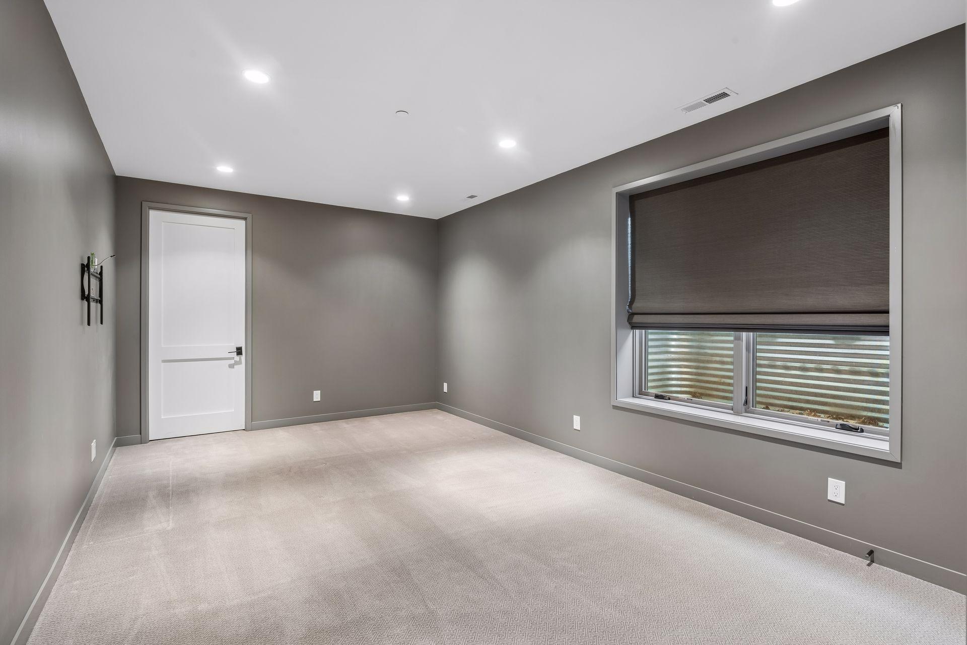 5th Bedroom with an Ensuite Bathroom in the Lower Level