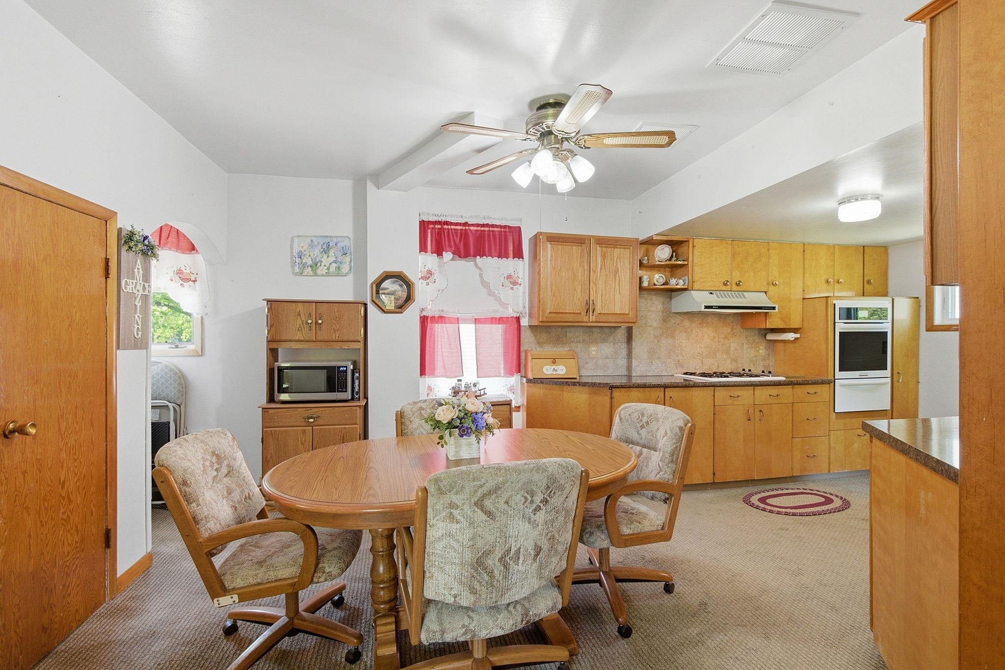 Spacious eat-in kitchen has many updates.