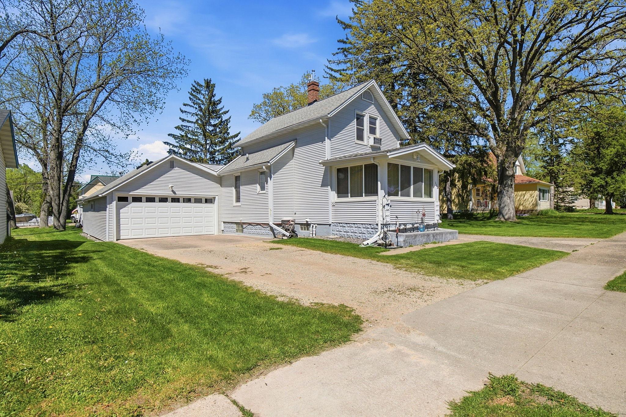 Great opportunity for a meticulously maintained home with double garage & bonus attached shop!