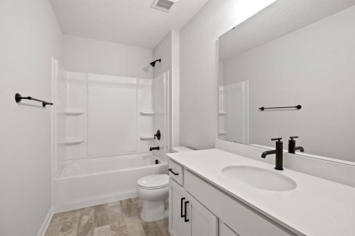 Upper level full bath shared by the 3 secondary bedrooms