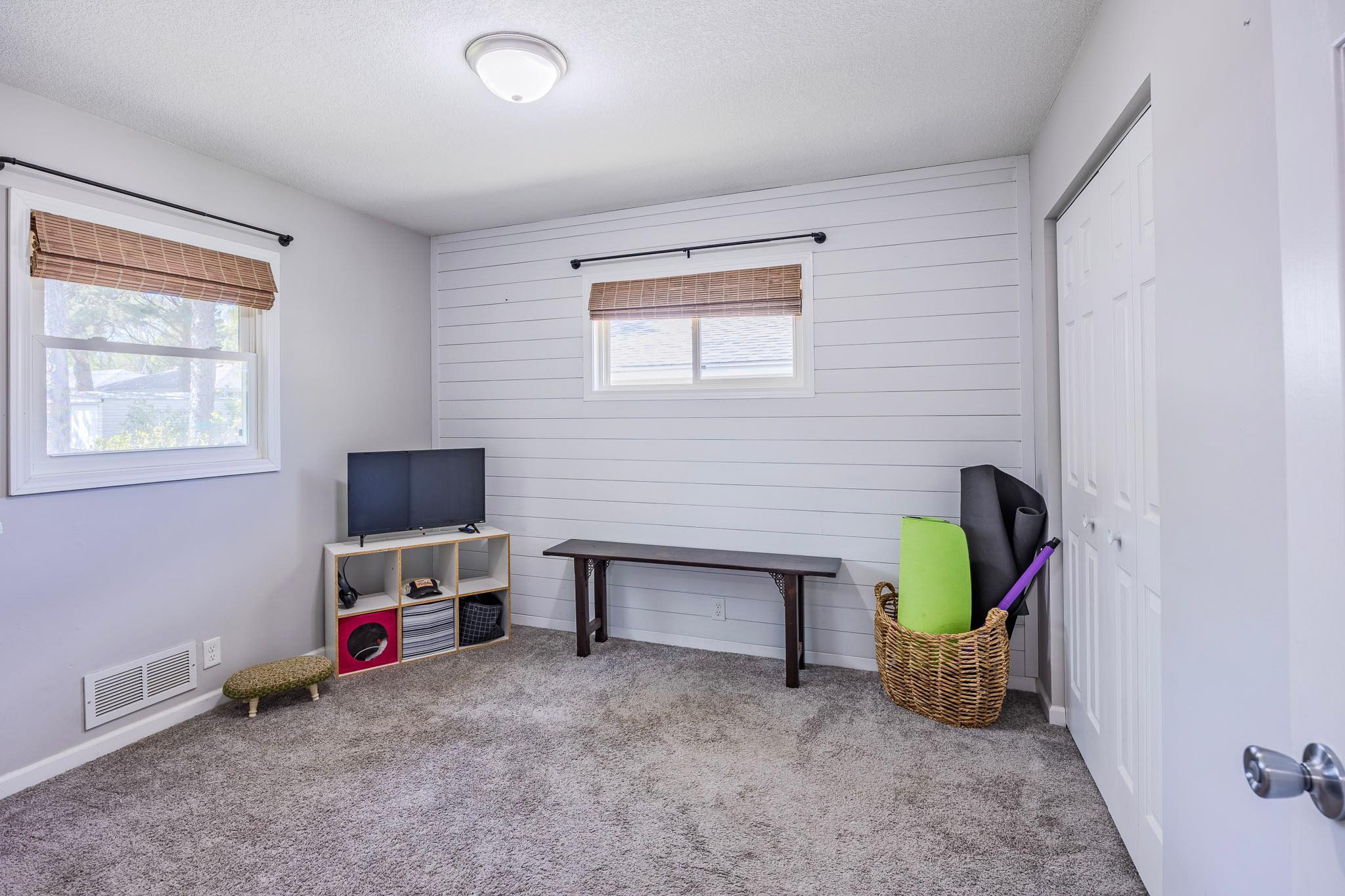Second main floor bedroom with shiplap acccent wall!