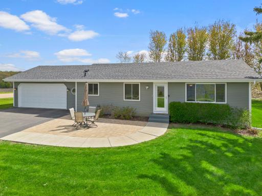 The house faces east west with the sun rising in the back and setting over the lake. There are multiple exterior places for you to enjoy views of the lake.