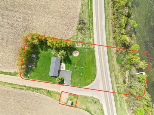 Approximate lot lines to show all of the land on the property. The road between the house and the lake is the main road between Waconia and St. Bonifacius so it can get busy. There is a small shed and additional parking across Parley Lake Road.