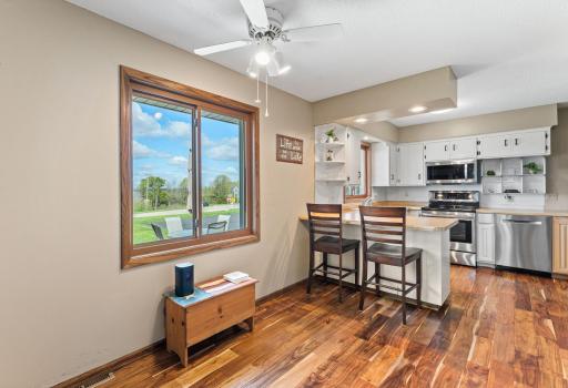 There are acacia hardwood floors throughout the main level of the home.