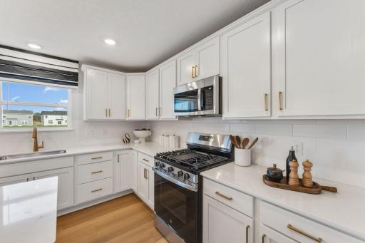 Gas range and microwave that vents to the exterior of the home make cooking a treat!