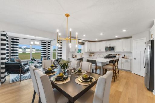 The kitchen flows right into the dining area in this open concept floorplan.
