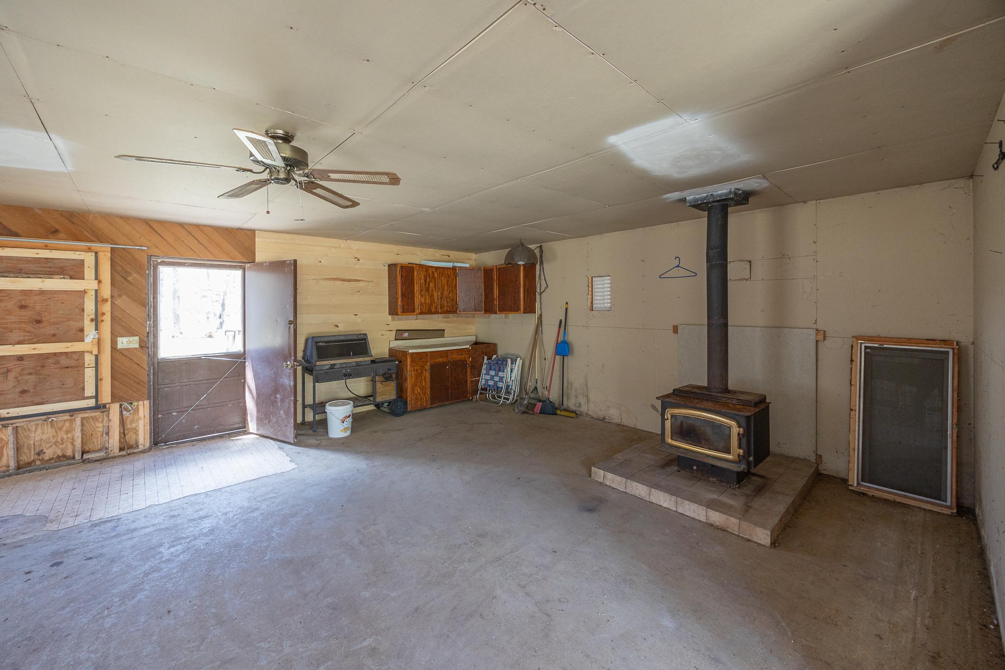 Wood burning stove in garage