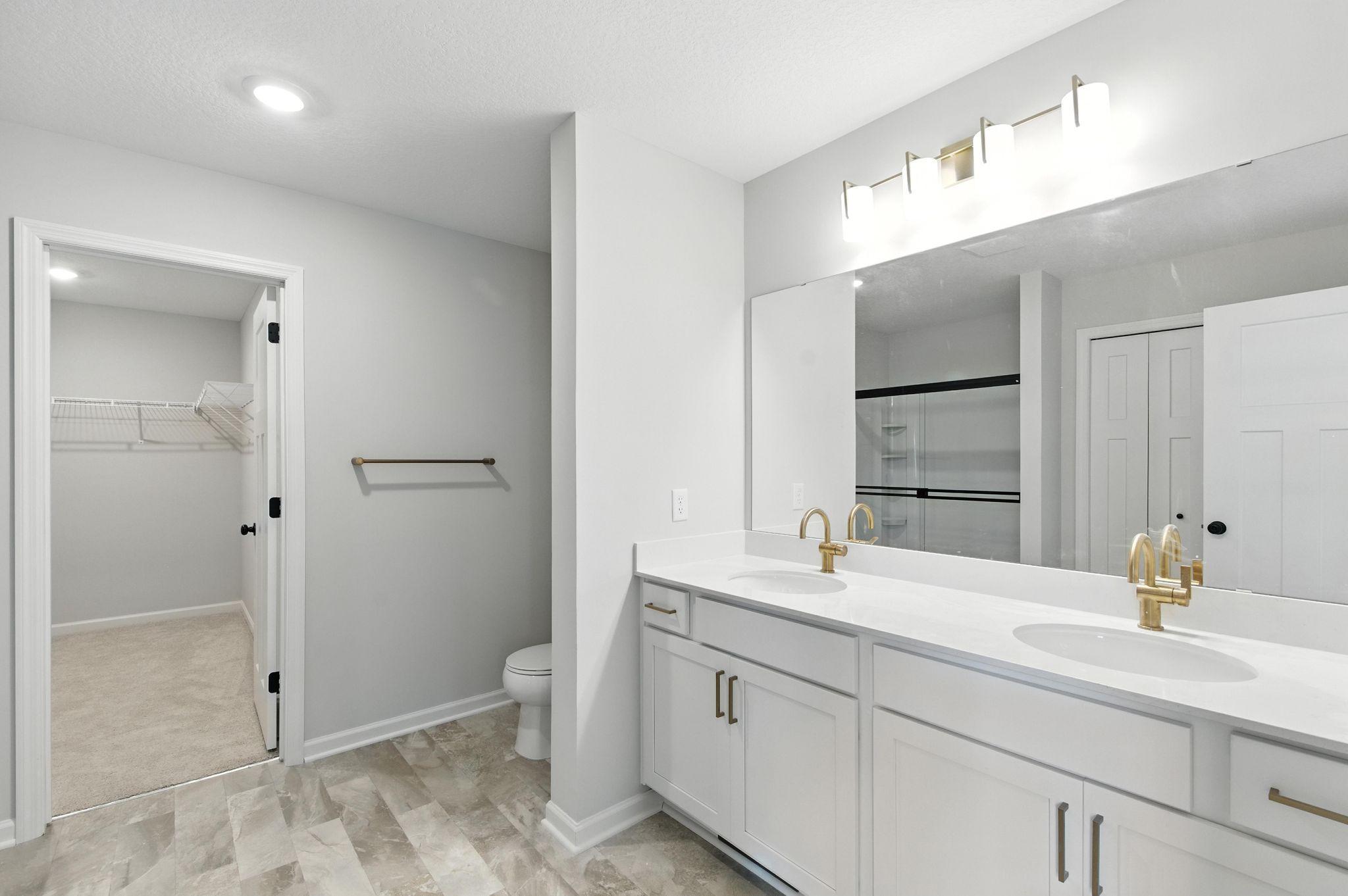 Owner's Bath - Pictures from previously build plan to showcase space. See agent for specific selections.