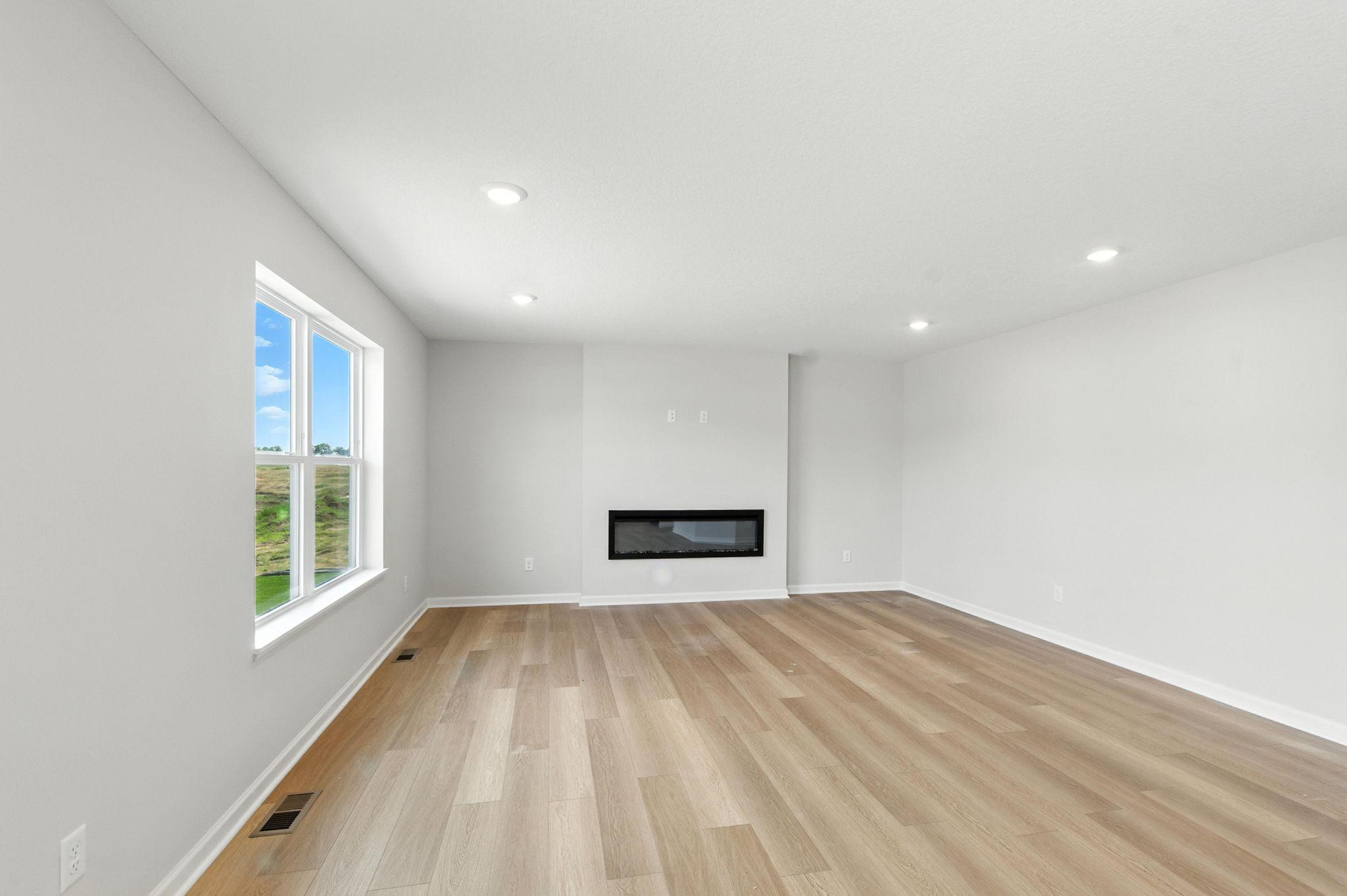 Family Room - Pictures from previously build plan to showcase space. See agent for specific selections.