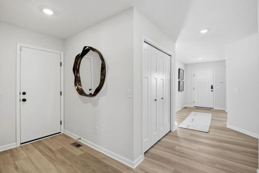 This home has abundant closet space! Front entry closet pictured, plus an additional closet next to half bath, plus one in the mud room.