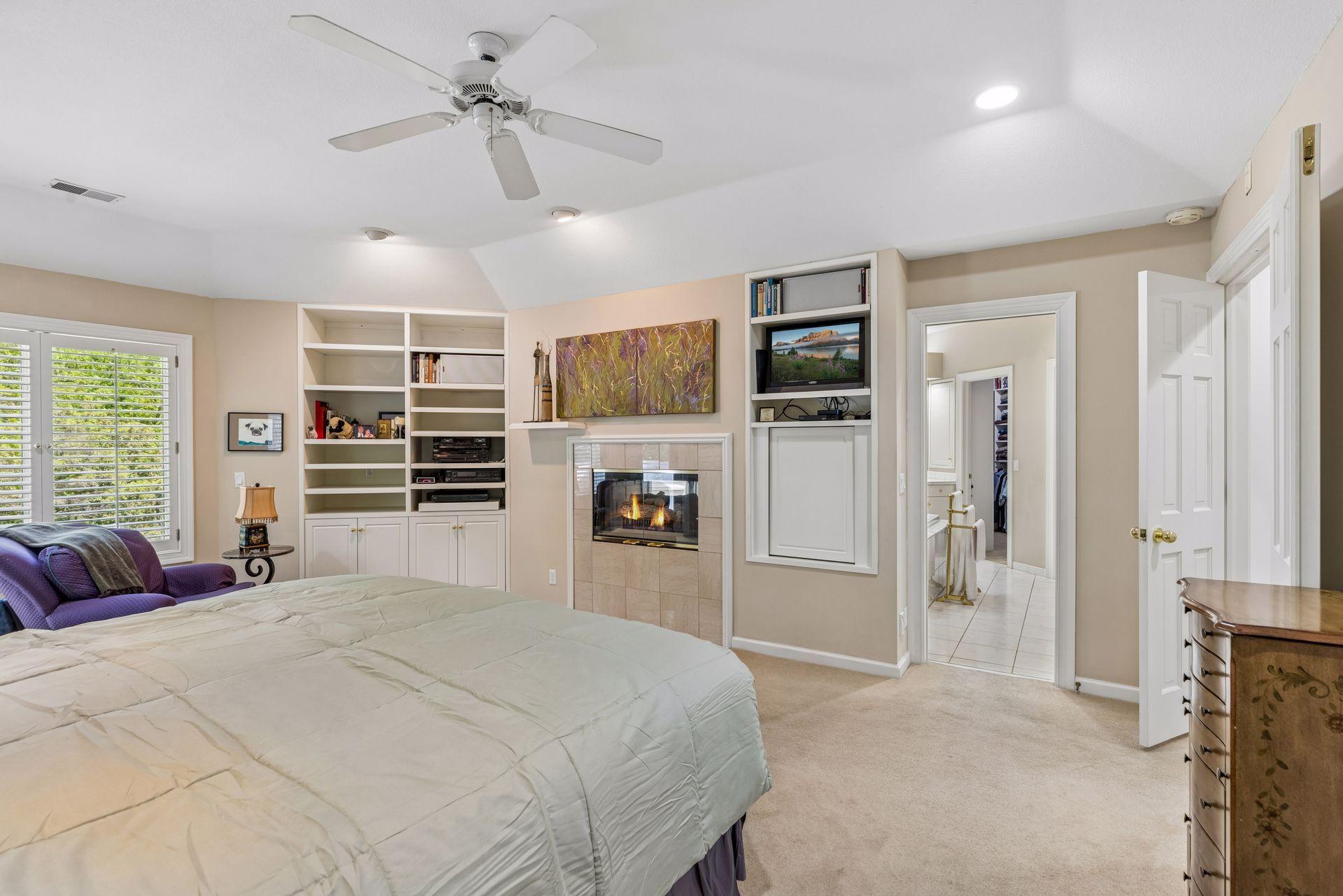 Two sided gas fireplace in Primary