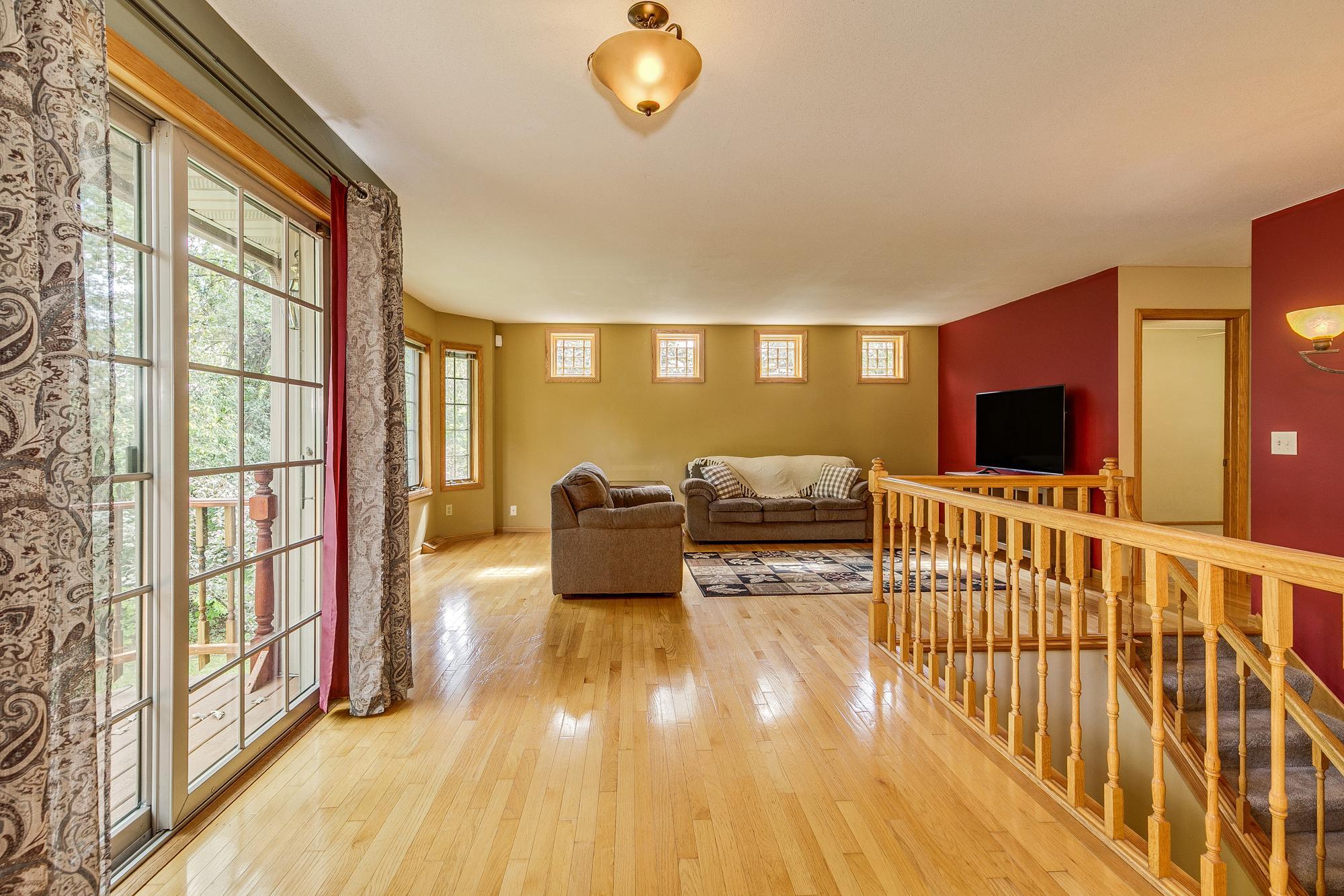 Living Room with 4 New Pella Architect Designer Windows and Anderson windows throughout home.
