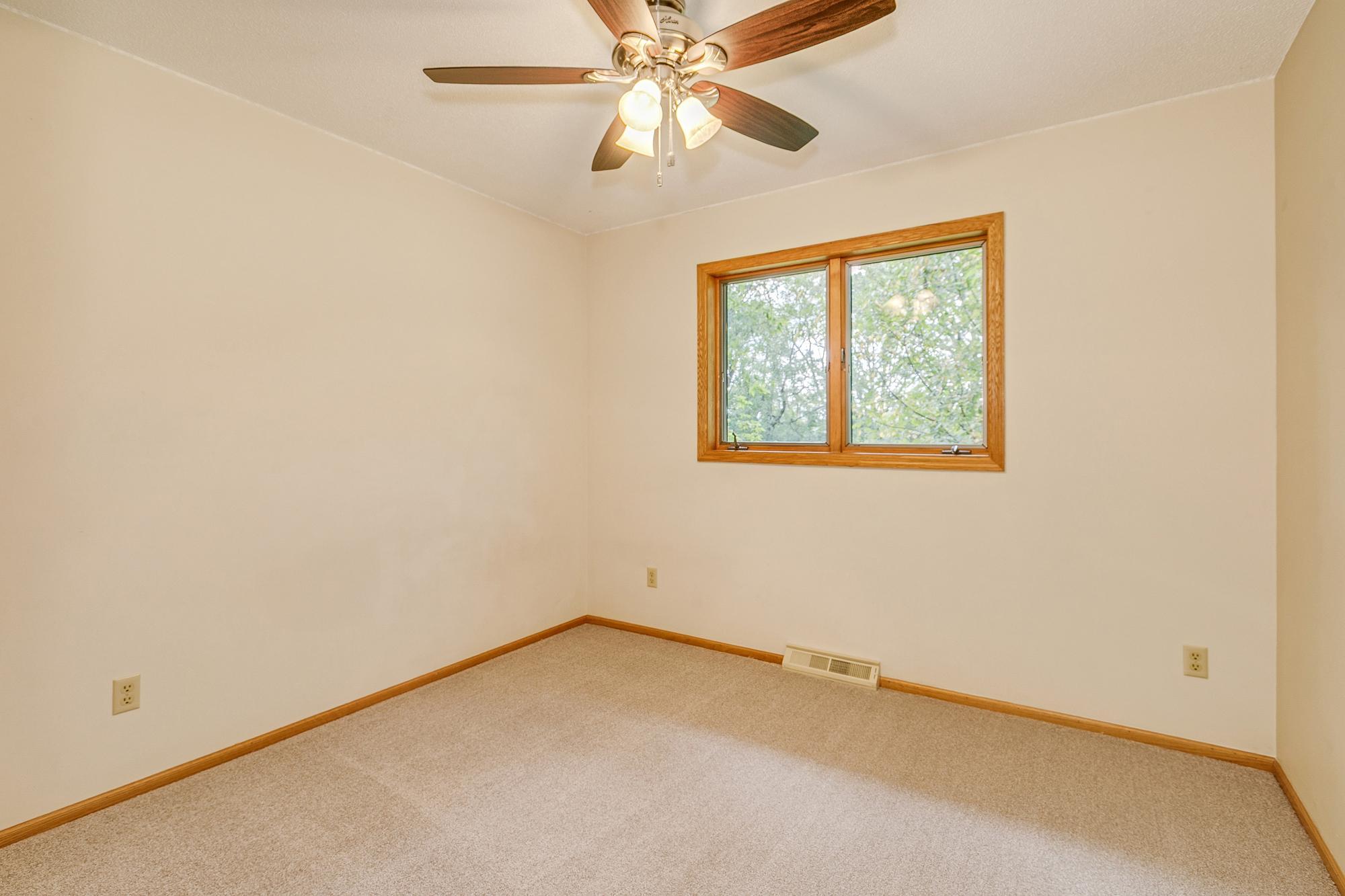 Upper 2nd Bedroom with New Carpet and Ceiling Fan