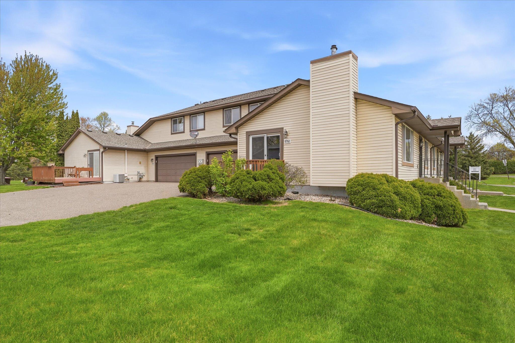Attractive exterior with maintenance-free siding, manicured grounds, and a quiet neighborhood setting.